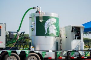 A mobile renewable EV charging station with an anaerobic digester and an external combustion engine