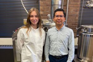 Agricultural science graduate student Kathryn Stahl and Dr. Liangchneg Yang work in the lab. Credit: Illinois State University