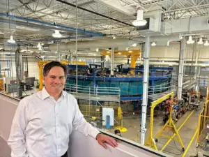 Scott Gardner, President, Svante Development, stands at Svante's headquarters in Burnaby, BC, Canada, in front of the company's commercial-sized carbon capture machine
